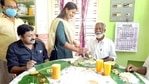 BJP candidate Kummanam Rajasekharan having sadya at the house of a party worker. (HT Photo) BJP candidate Kummanam Rajasekharan having sadya at the house of a party worker. (HT Photo)
