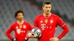 Bayern's Robert Lewandowski holds a ball before scoring from a penalty kick during the Champions League, round of 16, second leg soccer match between FC Bayern Munich and Lazio at the soccer Arena stadium in Munich, Germany.(AP) Bayern's Robert Lewandowski holds a ball before scoring from a penalty kick during the Champions League, round of 16, second leg soccer match between FC Bayern Munich and Lazio at the soccer Arena stadium in Munich, Germany.(AP)