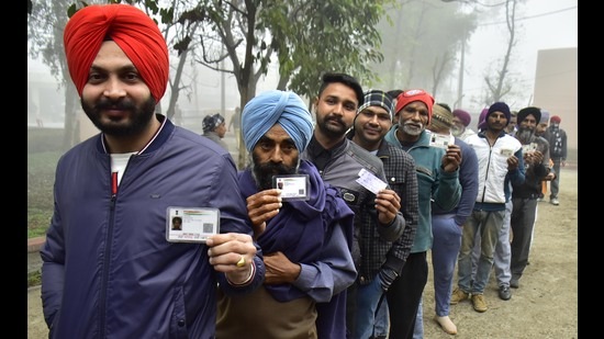 Voters queue to cast their votes at a polling station for the Punjab municipal elections at Majitha in Amritsar on February 14. (HT Photo) Voters queue to cast their votes at a polling station for the Punjab municipal elections at Majitha in Amritsar on February 14. (HT Photo)