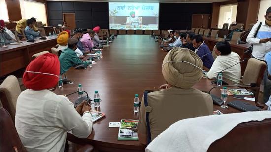Chief minister Capt Amarinder Singh interacting with mediapersons and district administration officials through video conferencing in Bathinda on Thursday. (Sanjeev Kumar/HT)