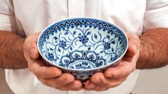 This photo, provided by Sotheby's, in New York, on Tuesday, March 2, 2021, shows a small porcelain bowl bought for $35 at a Connecticut yard sale that turned out to be a rare, 15th century Chinese artifact worth between $300,000 and $500,000. The bowl was auctioned off for nearly $722,000 at Sotheby's Auction of Important Chinese Art, in New York, on March 17. (Sotheby's via AP)(AP)