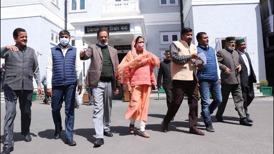 Congress MLAs staging a walk out during the budget session in Shimla on Thursday. (Deepak Sansta / HT) Congress MLAs staging a walk out during the budget session in Shimla on Thursday. (Deepak Sansta / HT)