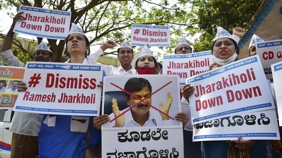 Members of the Aam Adami Party raise slogans against Karnataka Minister Ramesh Jarkiholi for his alleged involvement in CD row in Bengaluru, Wednesday, March 3, 2021. (PTI)