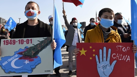 China has been rebuked globally for cracking down on Uyghur Muslims by sending them to mass detention camps, interfering in their religious activities and sending members of the community to undergo some form of forcible re-education or indoctrination. (Representative Image) (AP) China has been rebuked globally for cracking down on Uyghur Muslims by sending them to mass detention camps, interfering in their religious activities and sending members of the community to undergo some form of forcible re-education or indoctrination. (Representative Image) (AP)