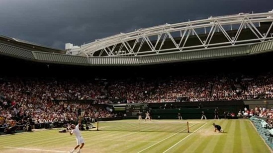 FILE PHOTO: Dark clouds drift over centre court during the finals match between Roger Federer of Switzerland and Rafael Nadal of Spain at the Wimbledon tennis championships in London July 6, 2008. (REUTERS) FILE PHOTO: Dark clouds drift over centre court during the finals match between Roger Federer of Switzerland and Rafael Nadal of Spain at the Wimbledon tennis championships in London July 6, 2008. (REUTERS)