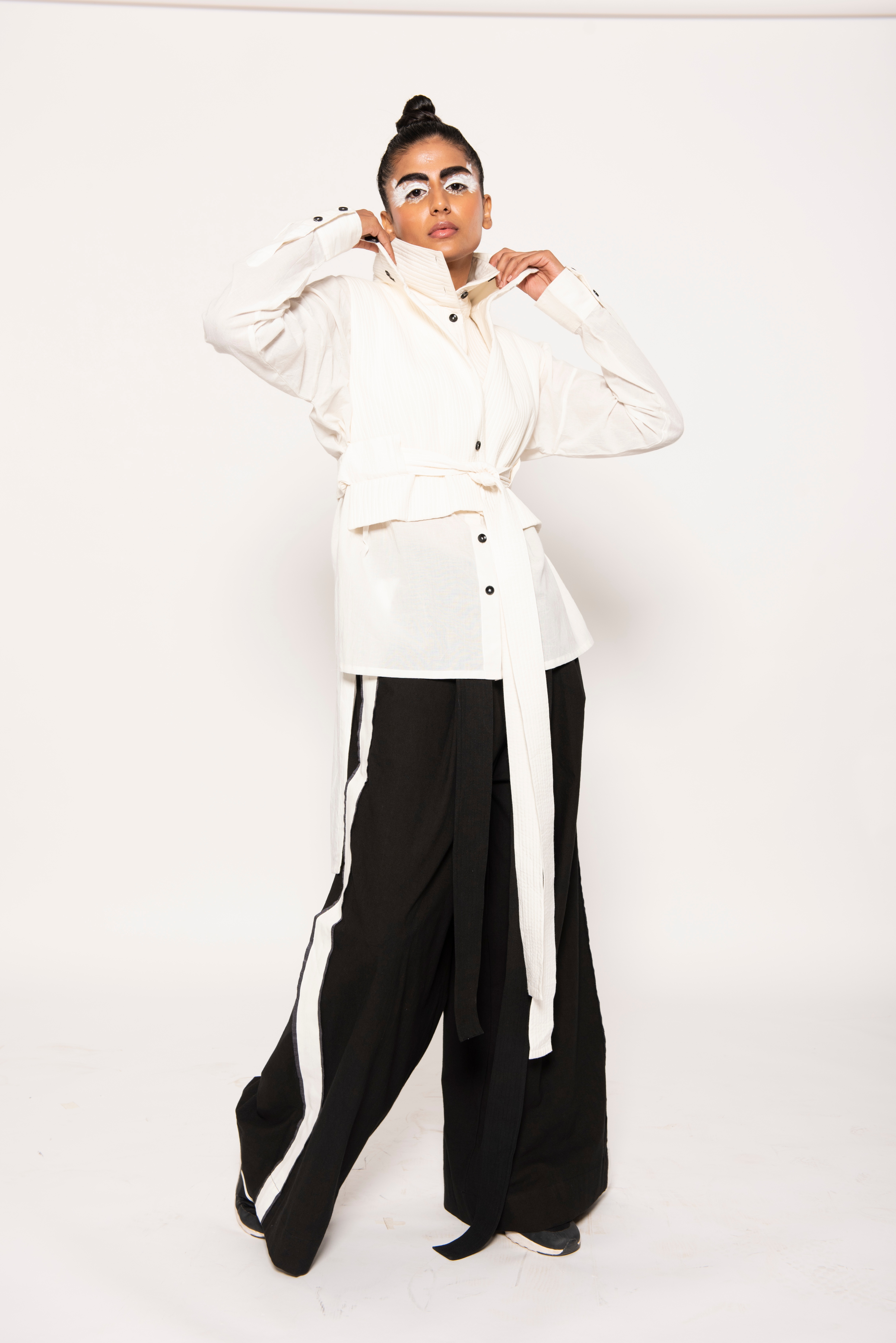 Chola by Sohaya Misra presented an eye-catching line titled, ‘Human Nature’ comprising striped robes, wide flowing pants and high collared blouses. (Photo: Instagram/FDCIOfficial) Chola by Sohaya Misra presented an eye-catching line titled, ‘Human Nature’ comprising striped robes, wide flowing pants and high collared blouses. (Photo: Instagram/FDCIOfficial)