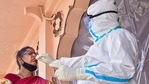 A healthcare worker takes nasal swab of a passenger from Maharashtra for a Covid-19 test upon his arrival at the Bikaner railway station.(PTI File Photo) A healthcare worker takes nasal swab of a passenger from Maharashtra for a Covid-19 test upon his arrival at the Bikaner railway station.(PTI File Photo)