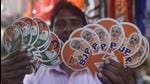 Merchandise of political parties displayed for sale ahead of the West Bengal Assembly elections at Burrabazar in Kolkata. Bengal goes to polls on March 27. (Samir Jana/HT PHOTO.)