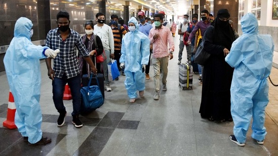 Healthcare workers check the temperature of the Passengers at Chhatrapati Shivaji Maharaj Terminus, in Mumbai on Friday. (ANI Photo) Healthcare workers check the temperature of the Passengers at Chhatrapati Shivaji Maharaj Terminus, in Mumbai on Friday. (ANI Photo)