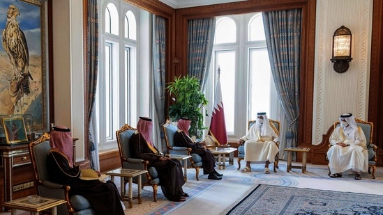 This handout picture released by the Qatar Amiri Diwan on March 8, 2021, shows Emir of Qatar Sheikh Tamim bin Hamad al-Thani (2nd-R) meeting with Saudi Arabia's Foreign Minister Prince Faisal bin Farhan Al-Saud (3rd-L) in the Qatari capital Doha. (AFP Photo / Qatar Amiri Diwan) This handout picture released by the Qatar Amiri Diwan on March 8, 2021, shows Emir of Qatar Sheikh Tamim bin Hamad al-Thani (2nd-R) meeting with Saudi Arabia's Foreign Minister Prince Faisal bin Farhan Al-Saud (3rd-L) in the Qatari capital Doha. (AFP Photo / Qatar Amiri Diwan)