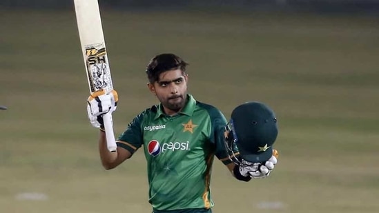 Pakistani batsman Babar Azam raises his bat and helmet (AP) Pakistani batsman Babar Azam raises his bat and helmet (AP)