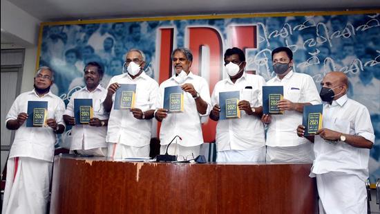 LDF convener A Vijayaraghavan (C) rleaing the ruling front’s manifesto ahead of Kerala Assembly polls in Thiruvananthapuram on Friday. (PTI)