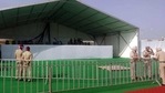 Police personnel stand guard at the Aam Aadmi Party rally venue in Baghapurana in Moga.(Sanjeev Kumar/Hindustan Times) Police personnel stand guard at the Aam Aadmi Party rally venue in Baghapurana in Moga.(Sanjeev Kumar/Hindustan Times)
