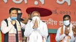 Prime Minister Narendra Modi is presented an Assamese Japi by chief minister Sarbananda Sonowal during a public rally in Tinsukia on Saturday.( PTI) Prime Minister Narendra Modi is presented an Assamese Japi by chief minister Sarbananda Sonowal during a public rally in Tinsukia on Saturday.( PTI)
