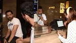 Emraan Hashmi and John Abraham sold tickets at a ticket counter. Emraan Hashmi and John Abraham sold tickets at a ticket counter.