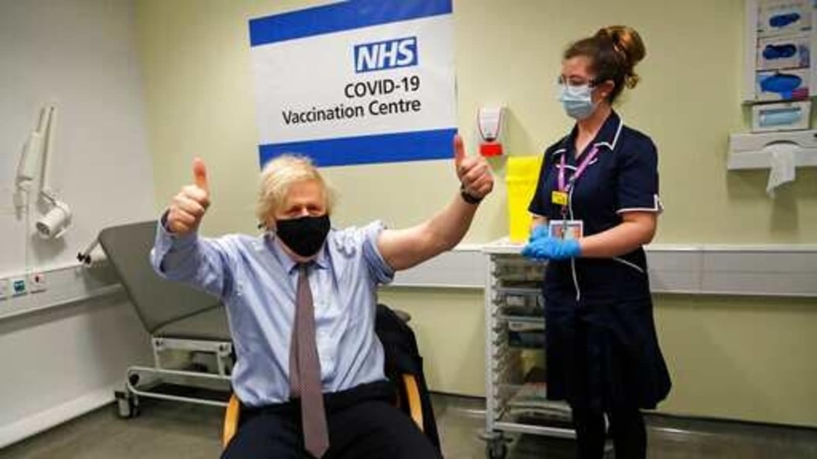 Britain administers first Covid-19 vaccine dose to half of all adults ...