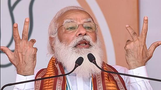 West Midnapore: Prime Minister Narendra Modi addresses an election campaign rally in support of BJP candidates, ahead of State Assembly polls, at BNR Ground, Kharagpur in West Midnapore district, Saturday, March 20, 2021. (PTI Photo/Swapan Mahapatra) (PTI03_20_2021_000102B) (PTI) West Midnapore: Prime Minister Narendra Modi addresses an election campaign rally in support of BJP candidates, ahead of State Assembly polls, at BNR Ground, Kharagpur in West Midnapore district, Saturday, March 20, 2021. (PTI Photo/Swapan Mahapatra) (PTI03_20_2021_000102B) (PTI)