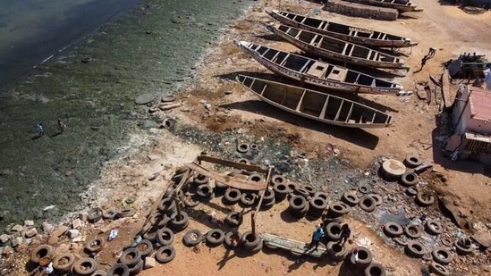 An aerial view shows water contaminated with raw sewage flowing via open channels into the ocean at Hann Bay on the eastern edge of Senegal's Dakar peninsula, whose sandy shorefront is discoloured by stagnant algae, on March 17. Inadequate sewer infrastructure in the adjacent neighbourhoods of Hann-Bel-air and Mbao means large amounts of solid and liquid waste is released into the bay untreated year-round.(Zohra Bensemra / REUTERS)
