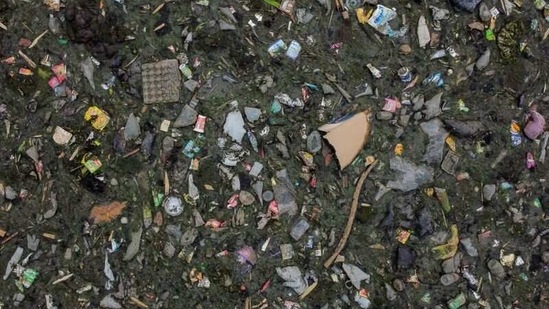 An aerial view shows domestic waste floating on the stream of the Citarum river in Bandung, Indonesia on March 15. The government has pledged to clean the Citarum river, considered among the world's most polluted, and make the water there drinkable by 2025, but household and industrial waste have continued to flow in its stream.(Willy Kurniawan / REUTERS)
