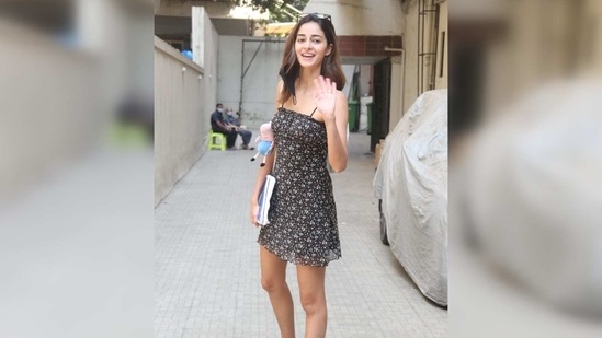 Ananya Panday was snapped outside Dharma office in Mumbai recently and she opted to wear a floral print dress for the day.(Varinder Chawla)