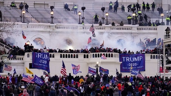 Violent rioters, loyal to Donald Trump, storm the Capitol in Washington.(AP / File)