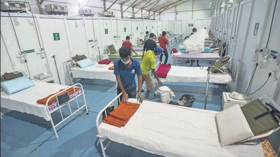 Preparation are underway at the jumbo Covid care centre at College Of Engineering Pune (COEP) ground. The facility will be operational from Monday. (Pratham Gokhale/HT Photo) Preparation are underway at the jumbo Covid care centre at College Of Engineering Pune (COEP) ground. The facility will be operational from Monday. (Pratham Gokhale/HT Photo)