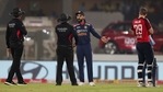 India's captain Virat Kohli, third left, interacts with the umpire after the dismissal of England's Jos Buttler during the fifth Twenty20 cricket match between India and England at Narendra Modi Stadium in Ahmedabad.(AP) India's captain Virat Kohli, third left, interacts with the umpire after the dismissal of England's Jos Buttler during the fifth Twenty20 cricket match between India and England at Narendra Modi Stadium in Ahmedabad.(AP)