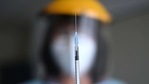 A medical assistant shows a syringe with the Pfizer-BioNTech Covid-19 vaccine for residents and staff at a nursing home for seniors in Froendenberg, western Germany.(AFP) A medical assistant shows a syringe with the Pfizer-BioNTech Covid-19 vaccine for residents and staff at a nursing home for seniors in Froendenberg, western Germany.(AFP)
