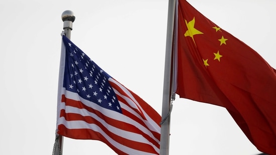 Chinese and US flags flutter outside the building of an American company in Beijing, China January 21, 2021.(Reuters)