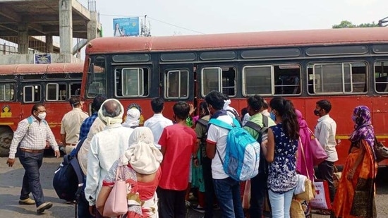 Passengers violate social distancing norms at a bus station in Nagpur.(ANI File Photo)