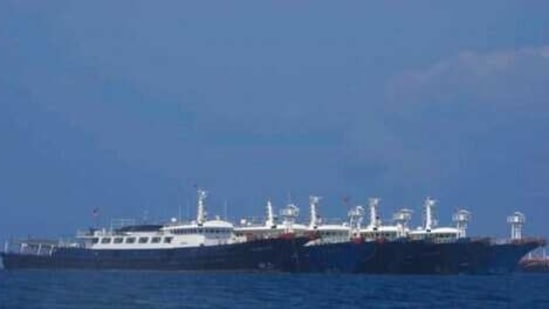 Some of the 220 Chinese vessels are seen moored at Whitsun Reef, South China Sea on March 7, 2021. (AP) Some of the 220 Chinese vessels are seen moored at Whitsun Reef, South China Sea on March 7, 2021. (AP)