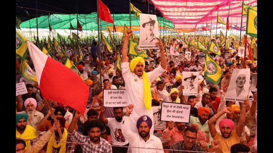 Protesters raising slogans during a rally in Sunam on Sunday.