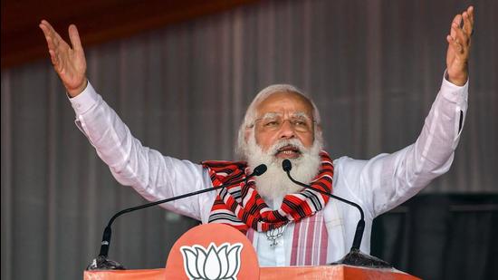 Golaghat: Prime Minister Narendra Modi addresses an election campaign rally for Assam Assembly polls, at Bokakhat in Golaghat district, Sunday, March 21, 2021. (PTI Photo) (PTI03_21_2021_000043B) (PTI) Golaghat: Prime Minister Narendra Modi addresses an election campaign rally for Assam Assembly polls, at Bokakhat in Golaghat district, Sunday, March 21, 2021. (PTI Photo) (PTI03_21_2021_000043B) (PTI)