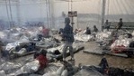 This March 20, 2021, photo provided by the Office of Rep. Henry Cuellar, D-Texas, shows detainees in a Customs and Border Protection (CBP) temporary overflow facility in Donna, Texas. President Joe Biden's administration faces mounting criticism for refusing to allow outside observers into facilities where it is detaining thousands of immigrant children. (AP) This March 20, 2021, photo provided by the Office of Rep. Henry Cuellar, D-Texas, shows detainees in a Customs and Border Protection (CBP) temporary overflow facility in Donna, Texas. President Joe Biden's administration faces mounting criticism for refusing to allow outside observers into facilities where it is detaining thousands of immigrant children. (AP)