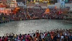 In this file photo taken on March 11, 2021 Hindu devotees attend evening prayers after taking a holy dip in the waters of the River Ganges on the Shahi Snan (grand bath) on the occasion of the Maha Shivratri festival during the ongoing religious Kumbh Mela festival in Haridwar. (AFP) In this file photo taken on March 11, 2021 Hindu devotees attend evening prayers after taking a holy dip in the waters of the River Ganges on the Shahi Snan (grand bath) on the occasion of the Maha Shivratri festival during the ongoing religious Kumbh Mela festival in Haridwar. (AFP)