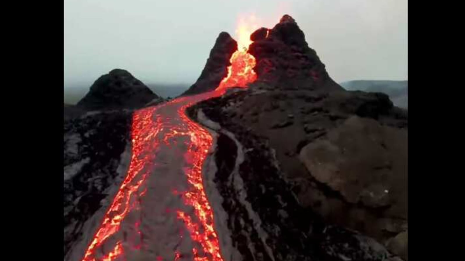 Spectacular drone footage captures lava spewing from Iceland volcano. Watch