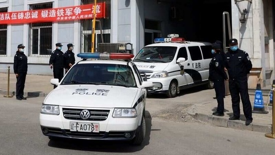 Police vehicles exit the Intermediate People's Court where Michael Spavor, a Canadian detained by China in December 2018 on suspicion of espionage, stood trial, in Dandong, Liaoning province, China.(REUTERS)