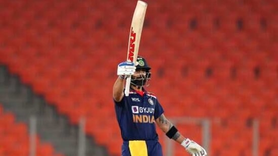 India's captain Virat Kohli raises his bat.(AP)