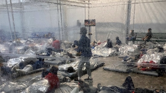 This March 20, 2021, photo provided by the Office of Rep. Henry Cuellar, D-Texas, shows detainees in a Customs and Border Protection (CBP) temporary overflow facility in Donna, Texas. President Joe Biden's administration faces mounting criticism for refusing to allow outside observers into facilities where it is detaining thousands of immigrant children. (AP) This March 20, 2021, photo provided by the Office of Rep. Henry Cuellar, D-Texas, shows detainees in a Customs and Border Protection (CBP) temporary overflow facility in Donna, Texas. President Joe Biden's administration faces mounting criticism for refusing to allow outside observers into facilities where it is detaining thousands of immigrant children. (AP)