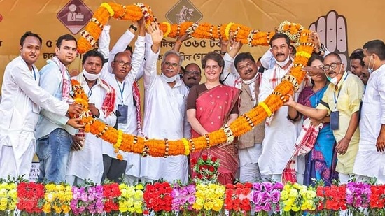 Congress General Secretary Priyanka Gandhi Vadra being garlanded at an election rally for Assam assembly polls in Koliabor on Monday. (PTI PHOTO.)