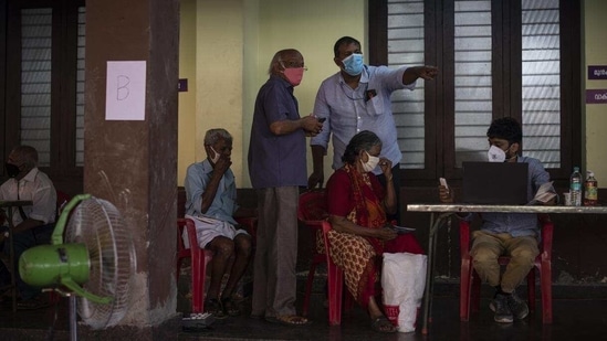 In the last 24 hours ending at 2 pm, 34,821 samples were tested and the test positivity rate was 3.56 per cent. In picture - Covid-19 vaccination camp in Kochi, Kerala.(AP)