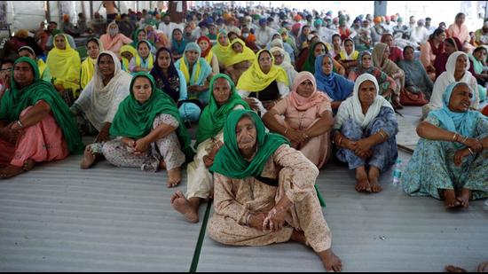 Elderly women farmers sit at the demonstration site during the ongoing farmer protest against the new farm laws at Singhu border, in New Delhi on Sunday. (ANI) Elderly women farmers sit at the demonstration site during the ongoing farmer protest against the new farm laws at Singhu border, in New Delhi on Sunday. (ANI)