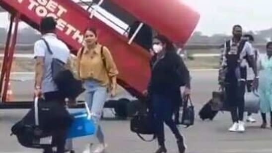 Screengrab from a video of Anushka Sharma and Virat Kohli at the Pune airport. 