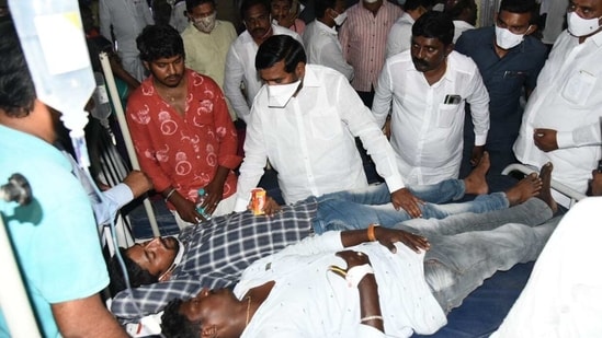 Telangana energy minister G Jagadeesh Reddy meeting the injured in Suryapet on Monday evening.(HT Photo)