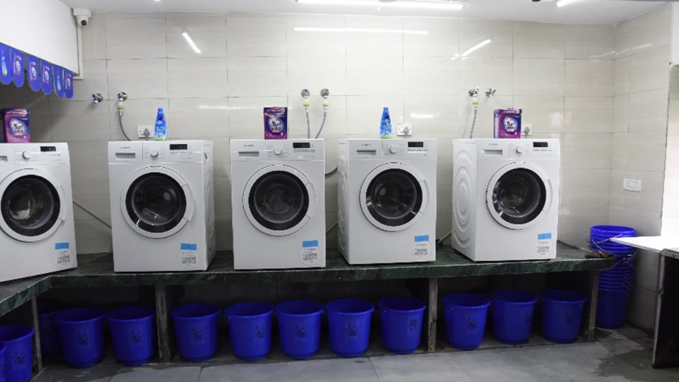 The Suvidha centres provide modern laundry facilities with detergent that help members of the community save time, energy, and money.(HUL) The Suvidha centres provide modern laundry facilities with detergent that help members of the community save time, energy, and money.(HUL)