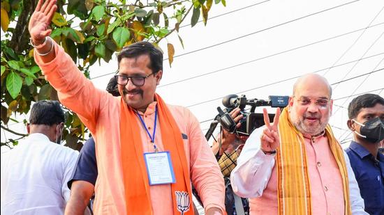 Union Home Minister and senior BJP leader Amit Shah participates in a roadshow, ahead of the West Bengal assembly polls, at Midnapore on Tuesday. The party named 11 candidates on Tuesday for the remaining seats. (PTI PHOTO.)