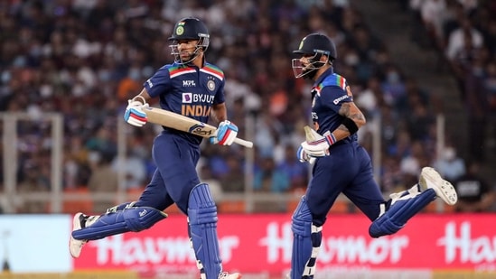 India's Shikhar Dhawan and captain Virat Kohli, right, run between wickets during the first Twenty20 cricket match between India and England in Ahmedabad, (AP) India's Shikhar Dhawan and captain Virat Kohli, right, run between wickets during the first Twenty20 cricket match between India and England in Ahmedabad, (AP)