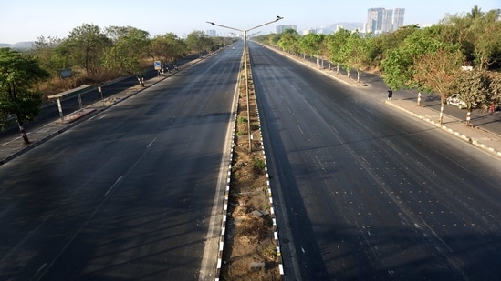 The Eastern Express Highway, deserted as India observed a day-long "Janata Curfew", which preceded the implementation of the nationwide lockdown, on March 22, 2020. Countless migrant workers hoping to reach home would soon descend on these empty roads.(Satish Bate / HT Archive)