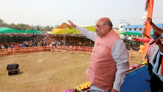 Union Home Minister and BJP leader Amit Shah addresses during a rally, ahead of West Bengal assembly polls at Gosaba in South 24 Parganas district, Tuesday, March 23, 2021. (PTI) Union Home Minister and BJP leader Amit Shah addresses during a rally, ahead of West Bengal assembly polls at Gosaba in South 24 Parganas district, Tuesday, March 23, 2021. (PTI)