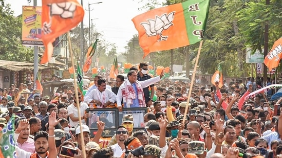 BJP leader Himanta Biswa Sarma participates in a roadshow, ahead of Assam assembly polls, at Titabor in Jorhat district.(PTI)